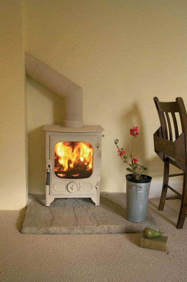 Charnwood Country 4 Woodburning Stove - The Charnwood Country 4 woodburning stove is the smallest model in the wood & multi-fuel room heating collection, yet still incorporates the ingenious features of the larger stoves. It is a neat, sturdy, yet graceful little fire and with a rated output of 4.8kW can be installed in certain situations, without the need for external air. The single door gives a complete and clear view of the fire and features a spinning primary air wheel for optimum control over the burning rate. In spite of its size, the Charnwood Country 4 takes a decent sized log length of 330mm (13") making it a very popular choice in the small stove market.