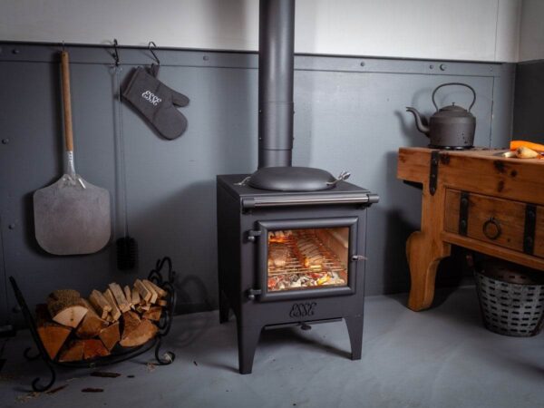 Esse Warmheart Cooking Stove - The compact Esse Warmheart wood-fired cooking stove is the perfect heating solution for a bijou country cottage or remote backcountry bothy. While its rugged cast-iron design and simple styling may give the impression that the Warmheart has been around for decades, this state-of-the-art piece of quality British engineering encapsulates everything we?ve learned in more than 160 years of manufacturing stoves and range cookers. Using the same principles as our best-selling Ironheart, the wood-fired Warmheart Stove provides ample heat to keep things warm and toasty while a casserole bubbles away on the hob or a couple of steaks sizzle in the firebox. No gas or electricity? No problem. The Warmheart comes into its own in an off-grid environment, making it the perfect choice for heating a bolt hole in the outback or a cabin in the woods.