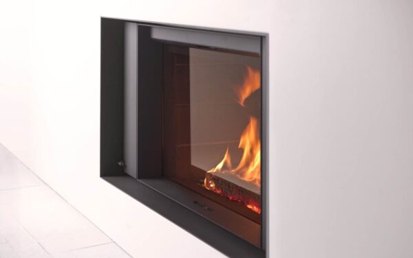 Stuv 22/90 Inset Woodburning Stove - Make the most out of the flames... thanks to an almost invisible frame. Infinitely customisable: steel, stone, wood... Thanks to a patented technique which means the finish material can be applied as close as possible to the fire. A unique appliance with peak efficiency. We invite you to find out more about the the story of Stûv 22. <hr /> Please <a href="https://www.topstak.co.uk/contact-us/" target="_blank" rel="noopener" data-schema-attribute="">contact us</a> to discuss details of frames, cladding and ducting.