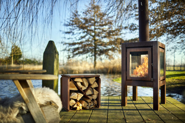 RB73 Quaruba XL - Outdoor Stove - 4 sides - The RB73 Quaruba XL is available in 3 different sizes, Large, XL and XXL. Model X is the middle of the 3. With it’s height of 95 cm it has beautiful high windows so you have a good view of the fire. The Quaruba model is a sturdy, robust wood stove with an industrial appearance for outdoor use. This cube-shaped terrace stove has a unique modular construction and is therefore assembled with 4 large glass panels. The door closure is cleared between the door panel and the right leg. The version with 4-wheel flooring is easy moveable. In addition, the platform can also be used as storage for the first stock of firewood. *Free next day delivery is available Monday - Friday (excluding Bank Holidays) on orders placed before 2pm. Any orders placed after this time will be processed and dispatched the following working day.